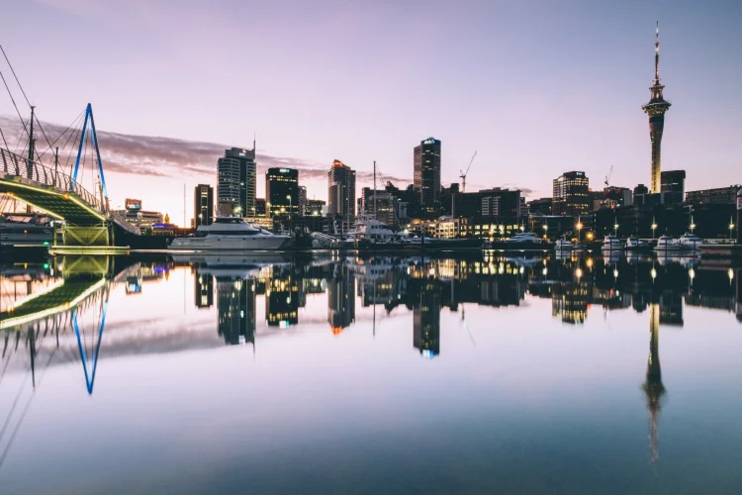 Auckland waterfront and purple skies - Credit: Dan Freeman, unsplash