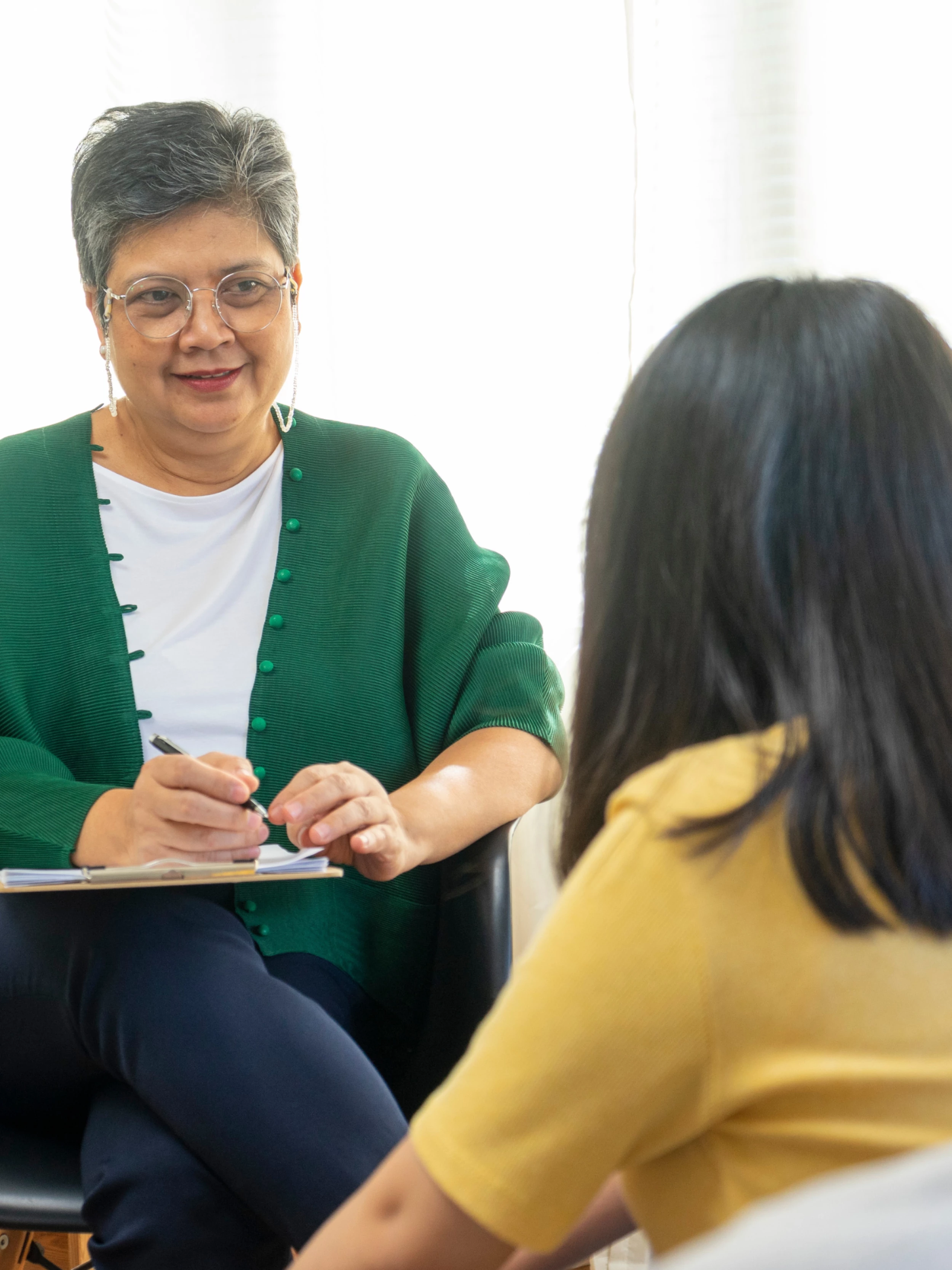 psychiatrist with patient - shutterstock-2139248373