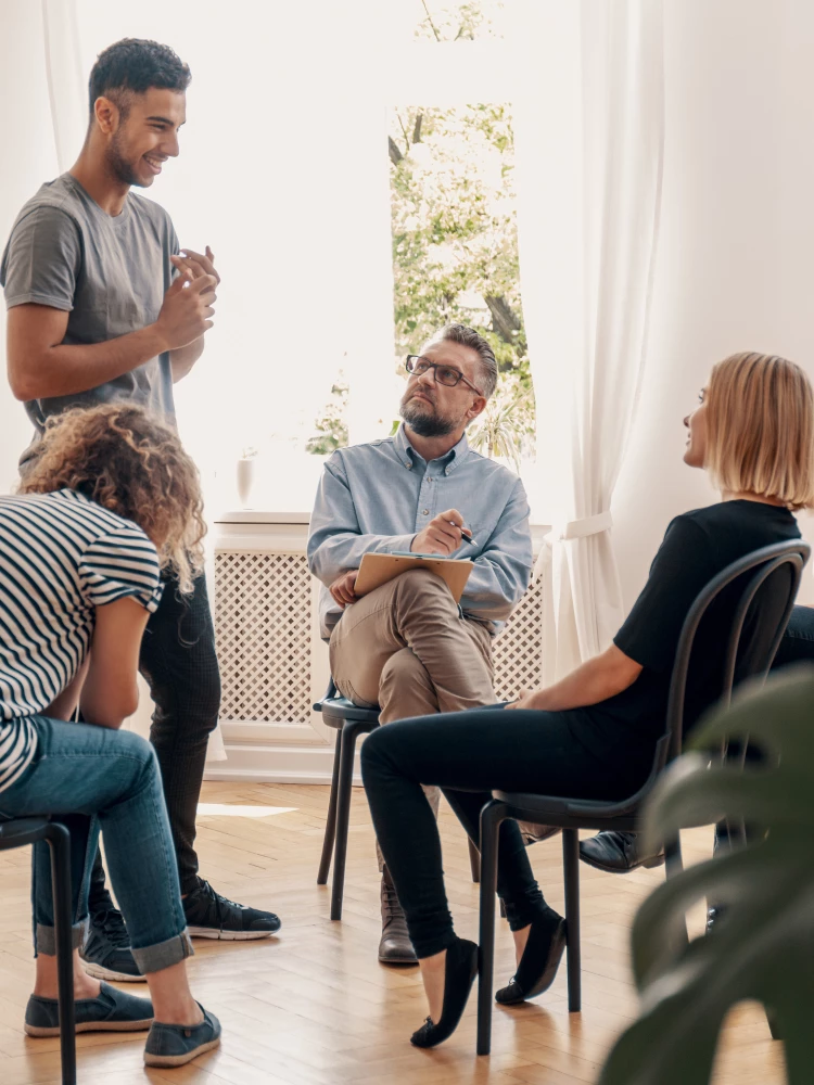 Psychiatrist group session with patients - Source: Shutterstock