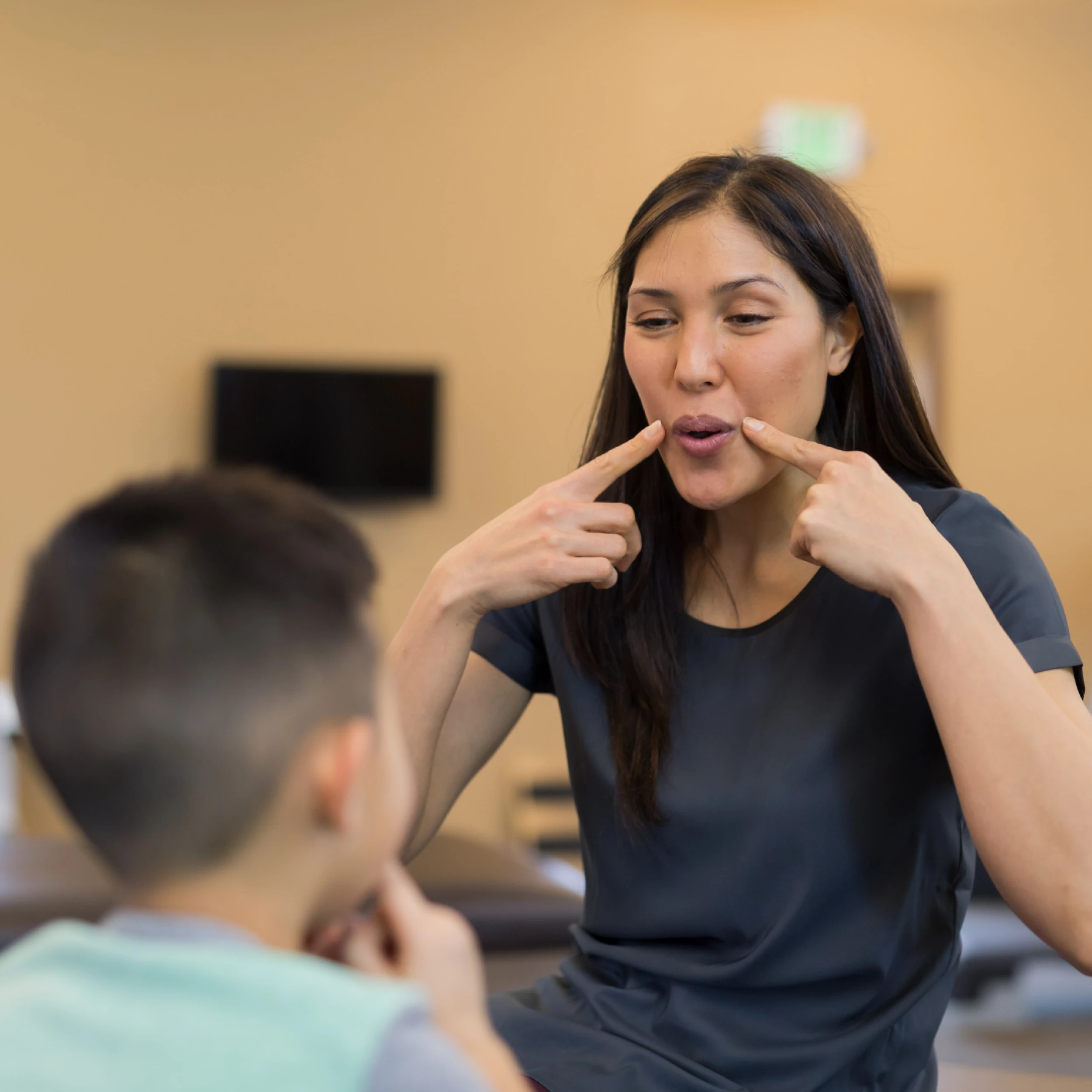 Speech Therapist with patient (stock image)